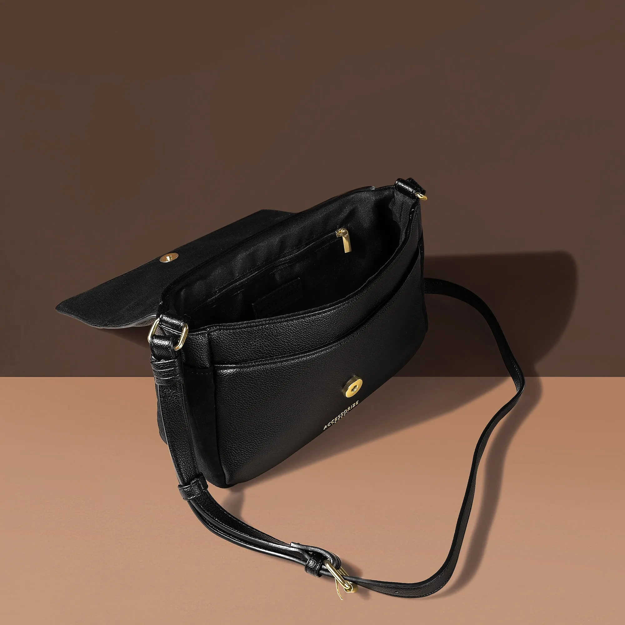 Accessorize London Women's Black Caffy Camera Braided Faux Leather Sling Bag