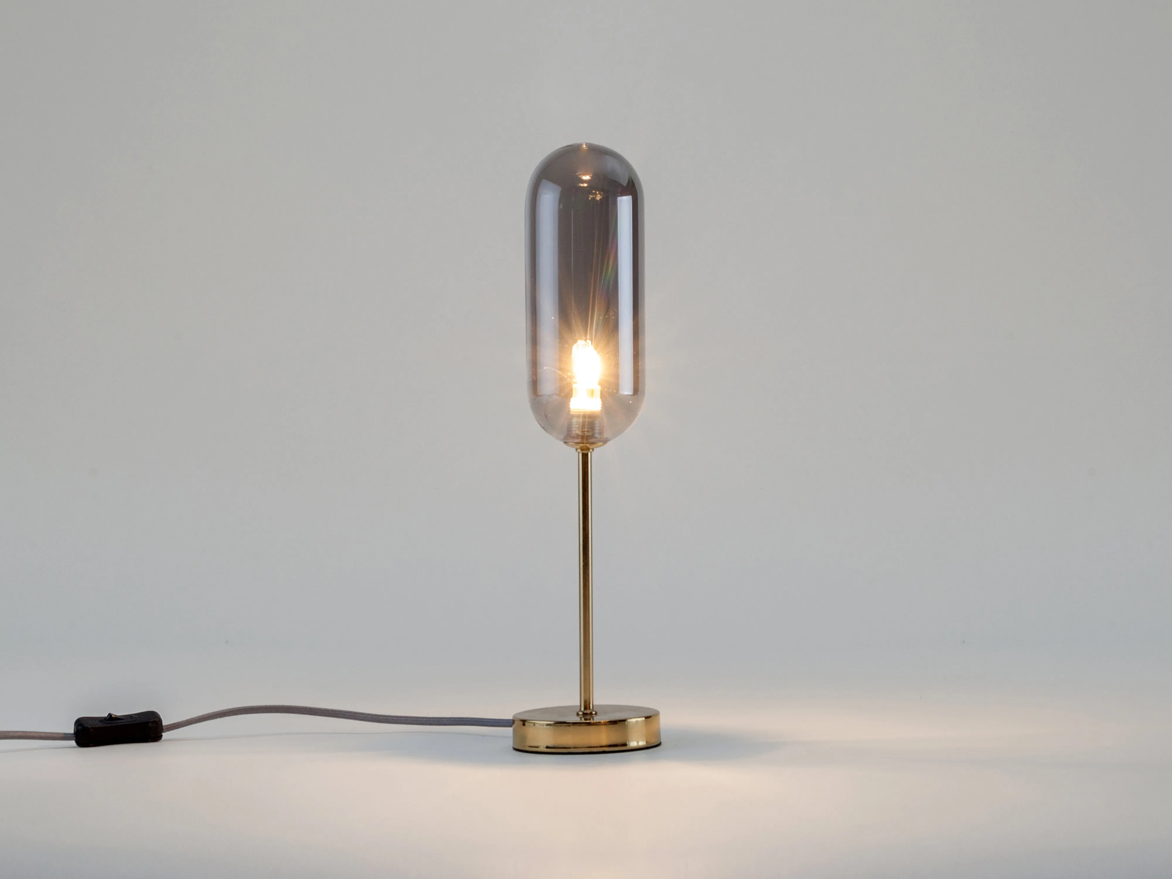 Brass pill table lamp